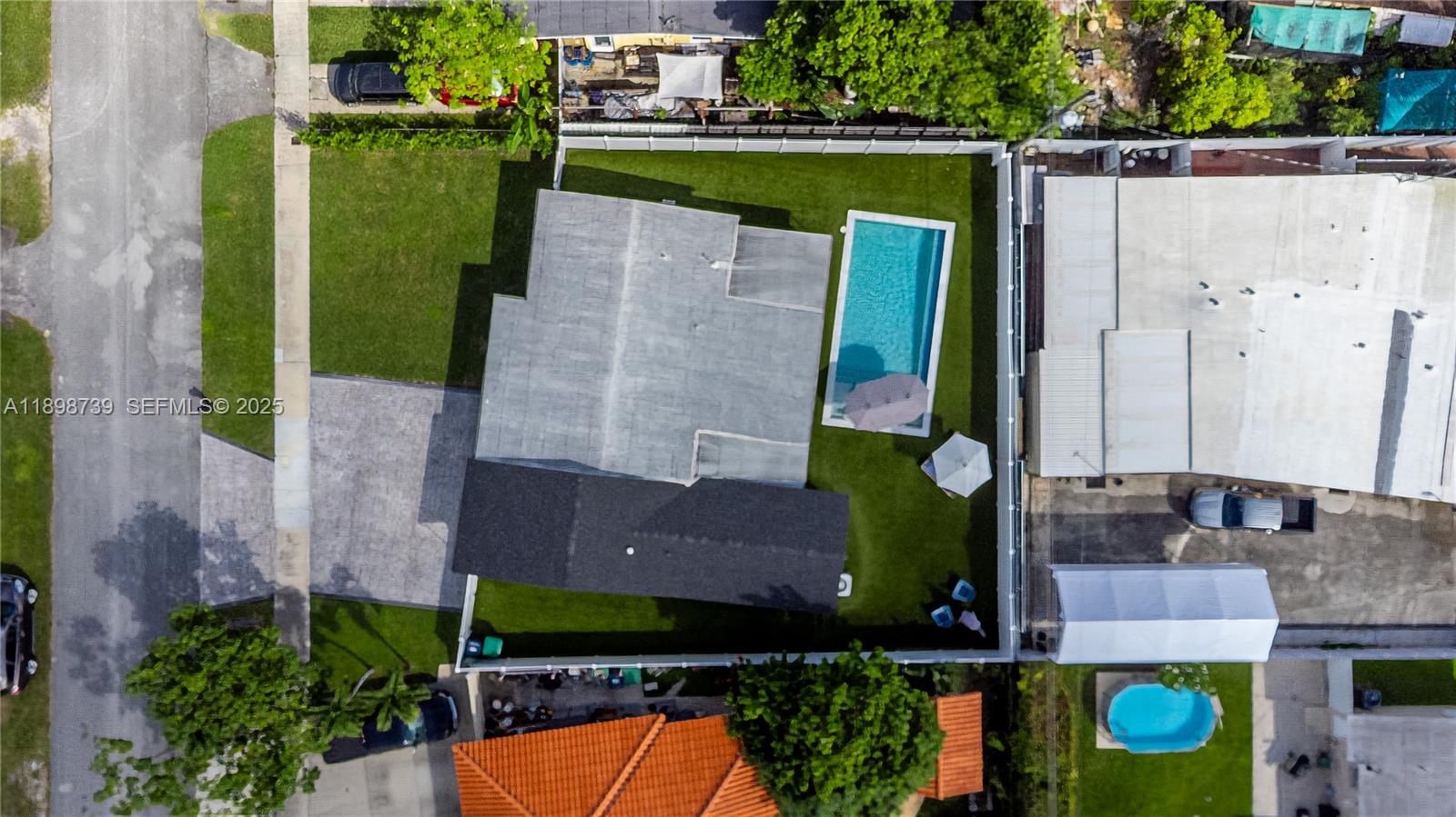 11350 Southwest 57th Street Miami, FL 33173 - Photo 44 of 47 an aerial view of a house with a swimming pool