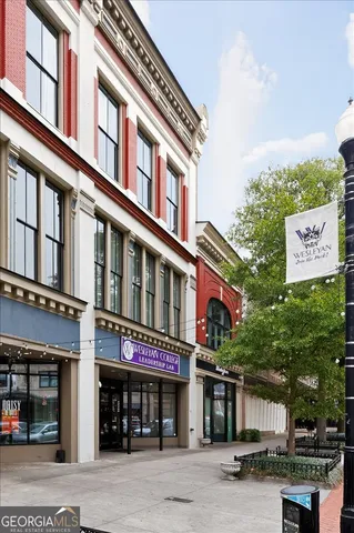 a view of a building with a window and balcony