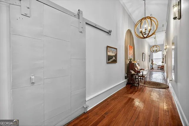 a view of dining room with wooden floor