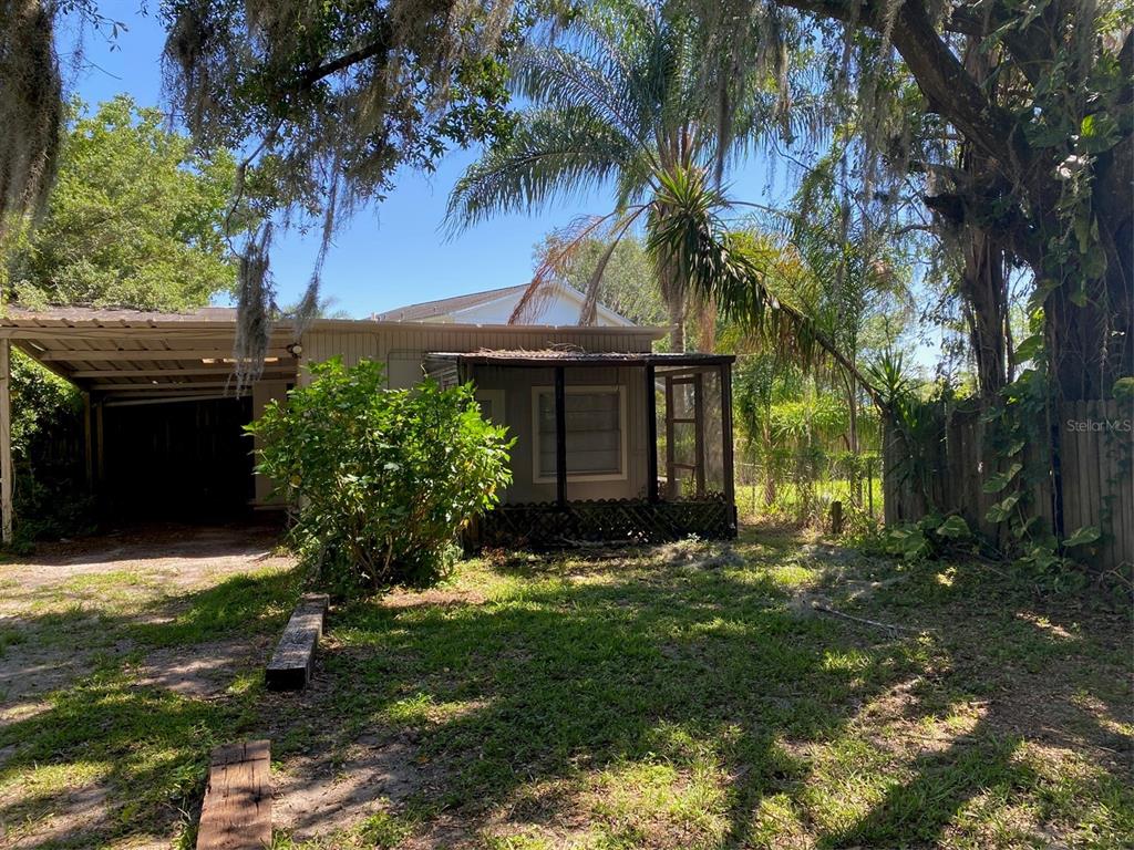 1626 Roosevelt Avenue, Unit C Orlando, FL 32804 - Photo 1 of 6 a view of a house with a yard and tree s
