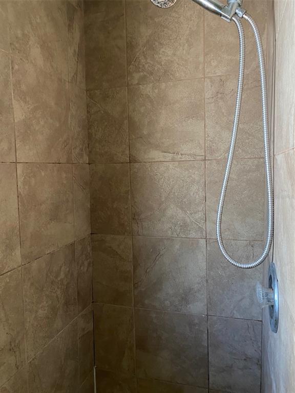 1626 Roosevelt Avenue, Unit C Orlando, FL 32804 - Photo 6 of 6 a bathroom with a shower