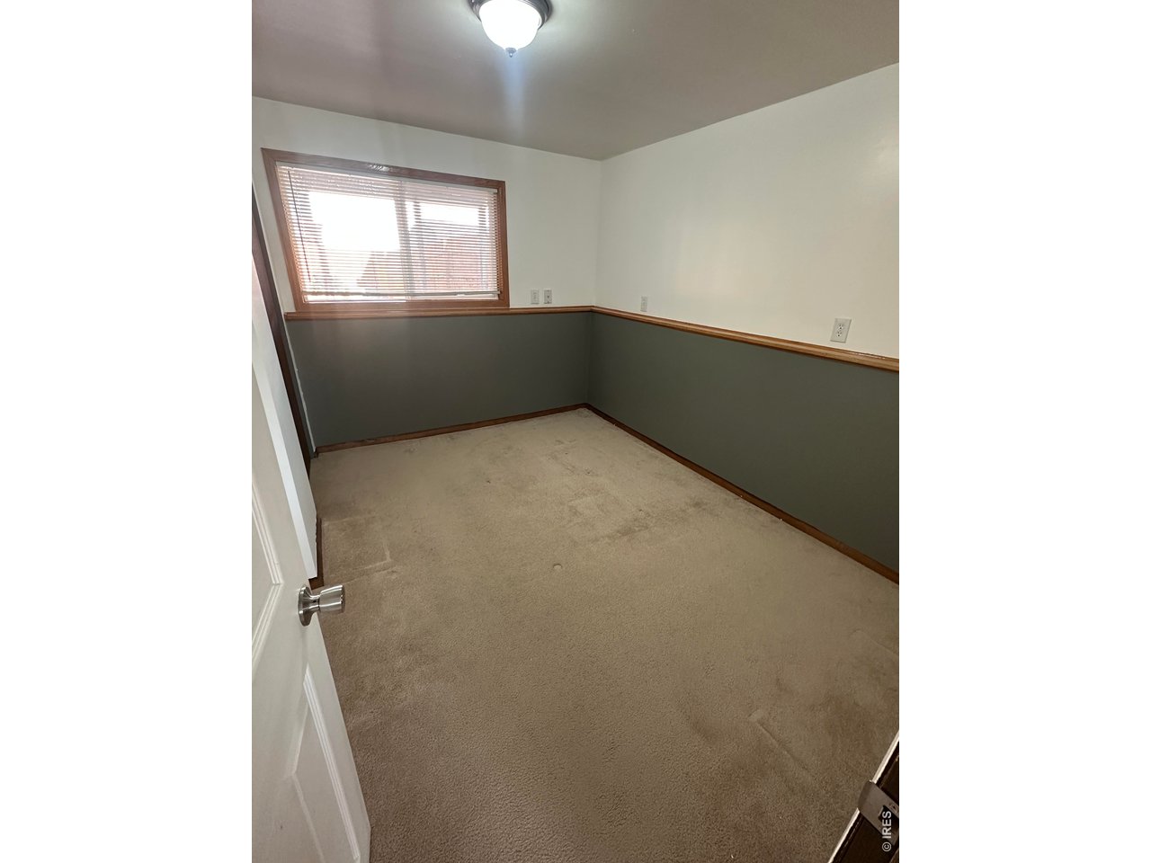 268 Fifth Street Firestone, CO 80520 - Photo 20 of 25 a view of an empty room with a window