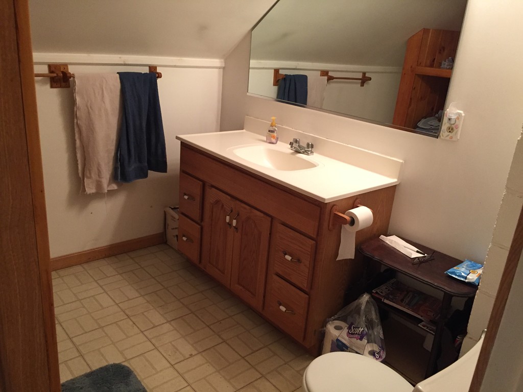 46 Smith Street Palmer, MA 01069 - Photo 11 of 17 a bathroom with a sink vanity and toilet