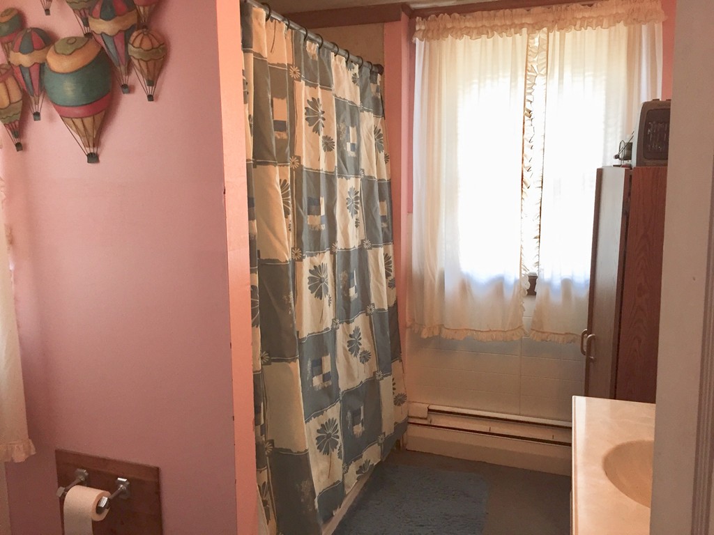 46 Smith Street Palmer, MA 01069 - Photo 15 of 17 a bathroom with a bathtub and shower
