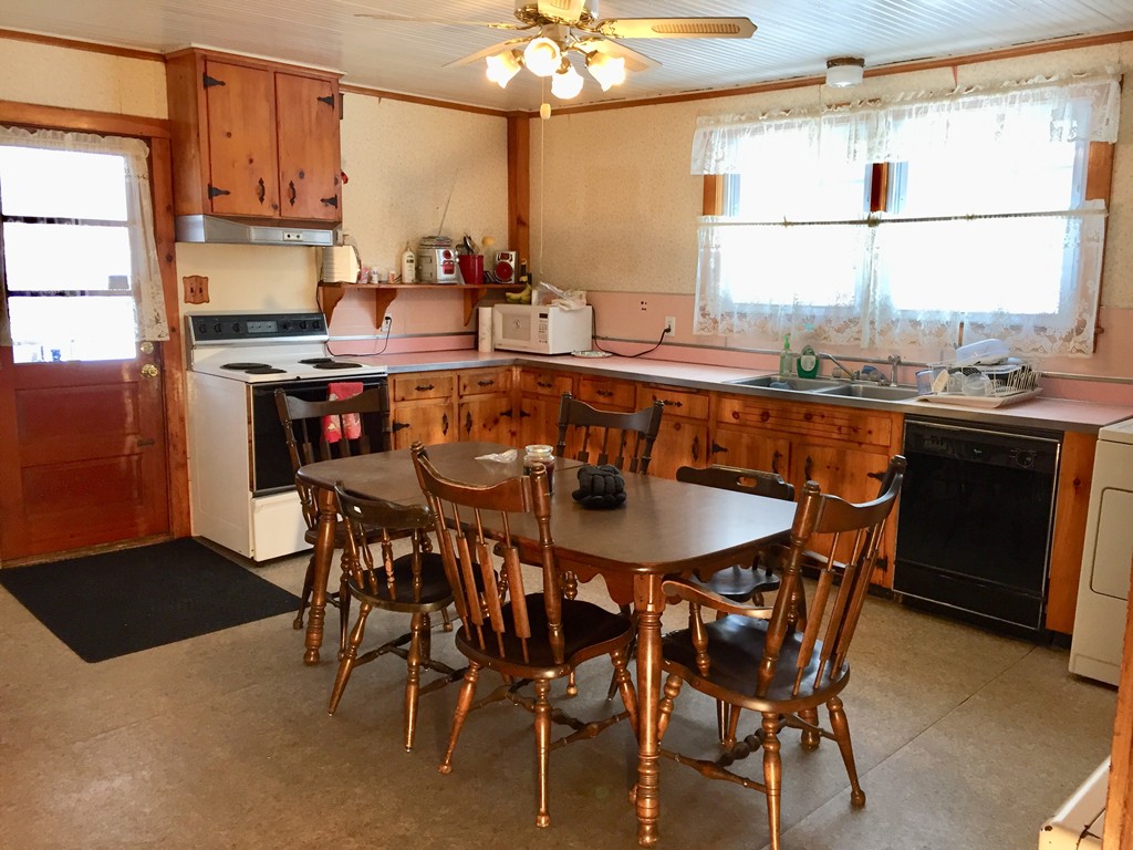 46 Smith Street Palmer, MA 01069 - Photo 17 of 17 a view of a dining room with furniture and a chandelier