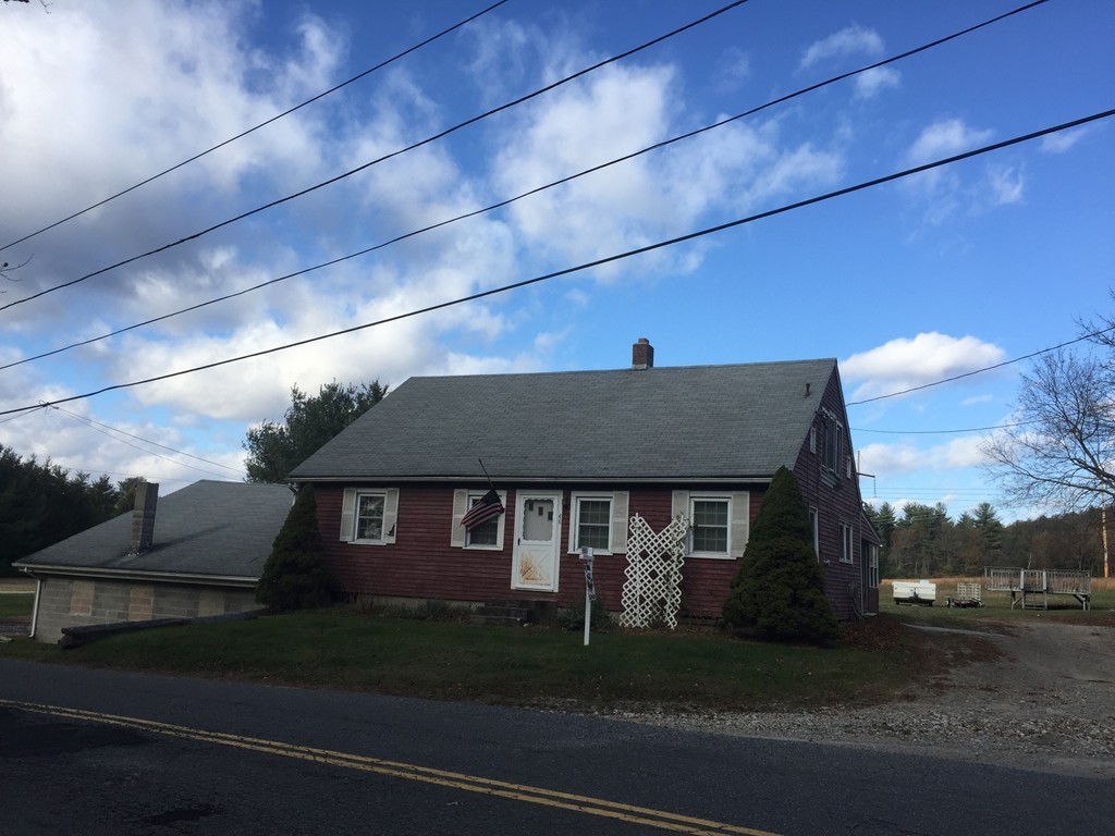 46 Smith Street Palmer, MA 01069 - Photo 2 of 17 a front view of a house with garden