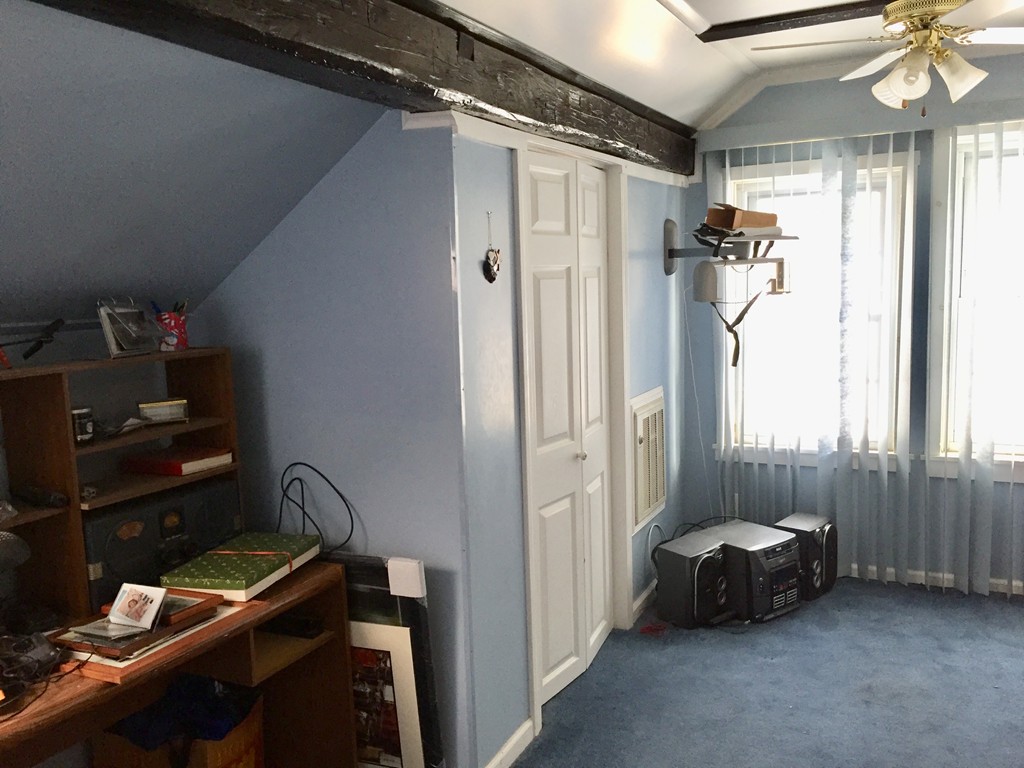 46 Smith Street Palmer, MA 01069 - Photo 9 of 17 a bedroom with furniture and a window