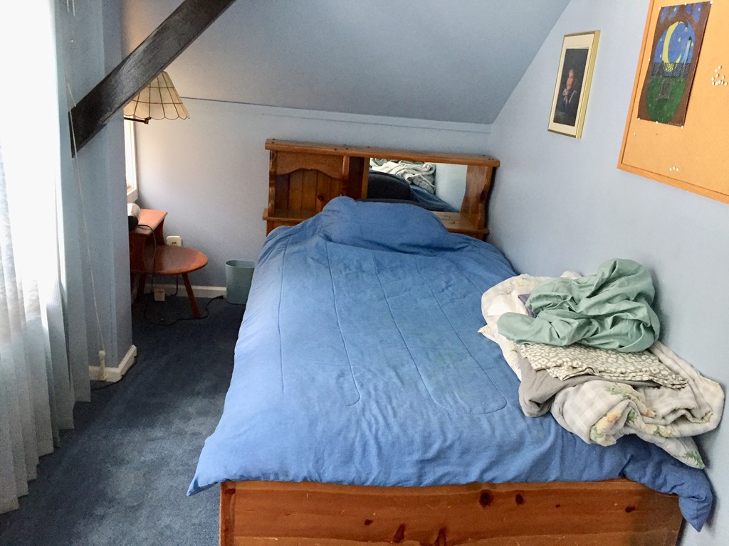 46 Smith Street Palmer, MA 01069 - Photo 10 of 17 a bedroom with a bed and wooden floor