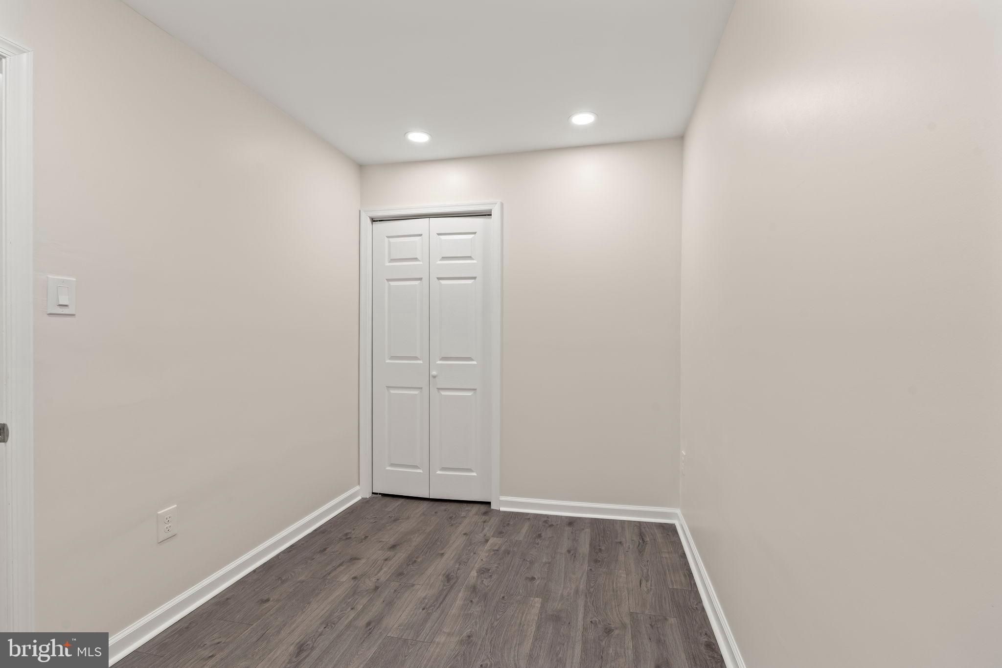 1840 North Taylor Street Philadelphia, PA 19121 - Photo 18 of 29 a view of an empty room with wooden floor
