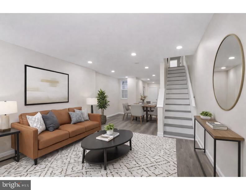 1840 North Taylor Street Philadelphia, PA 19121 - Photo 2 of 29 a living room with furniture and a wooden floor