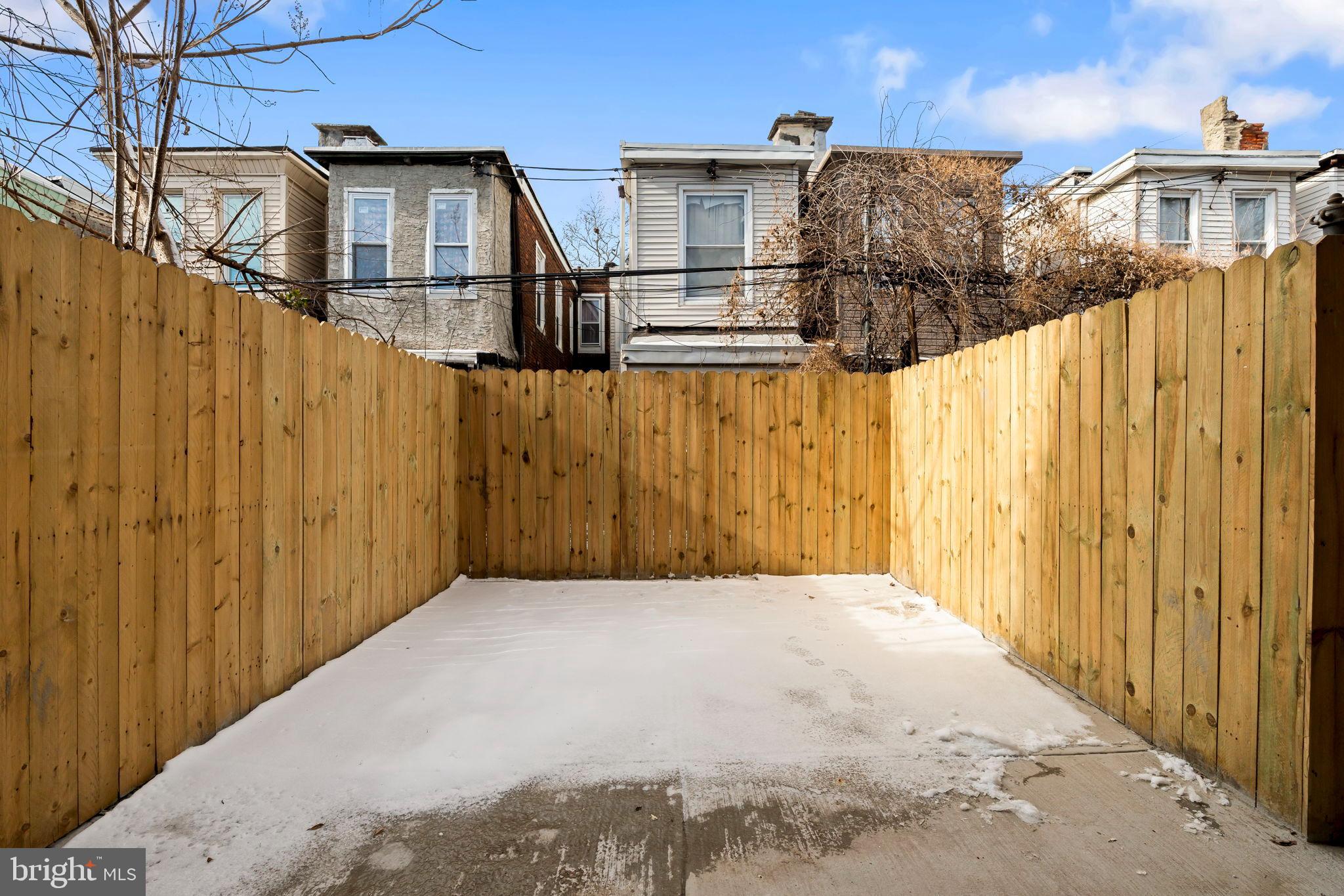 1840 North Taylor Street Philadelphia, PA 19121 - Photo 25 of 29 a view of a house with wooden fence