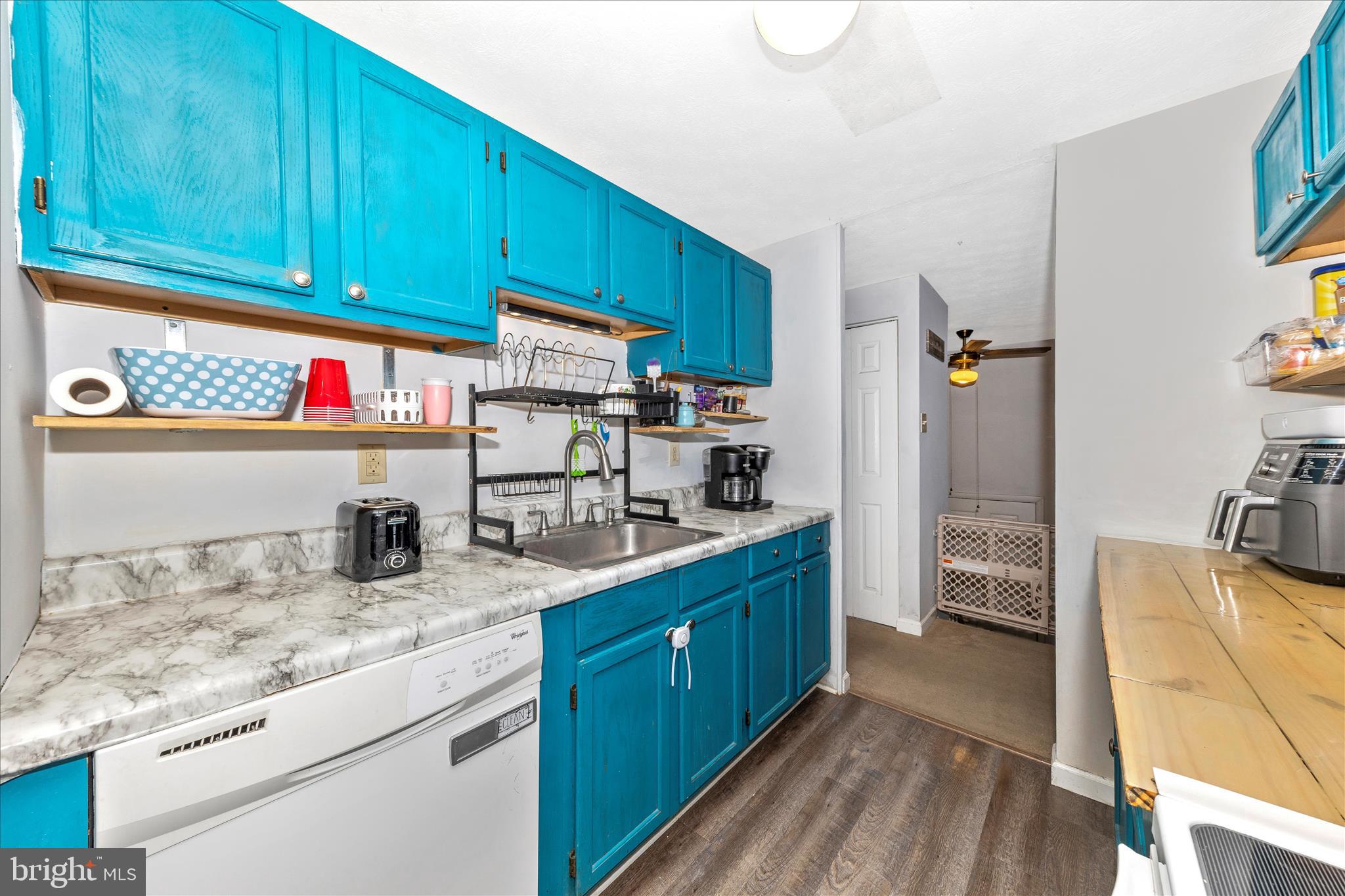 7129 Limestone Lane Middletown, MD 21769 - Photo 14 of 37 a kitchen with sink cabinets and stove