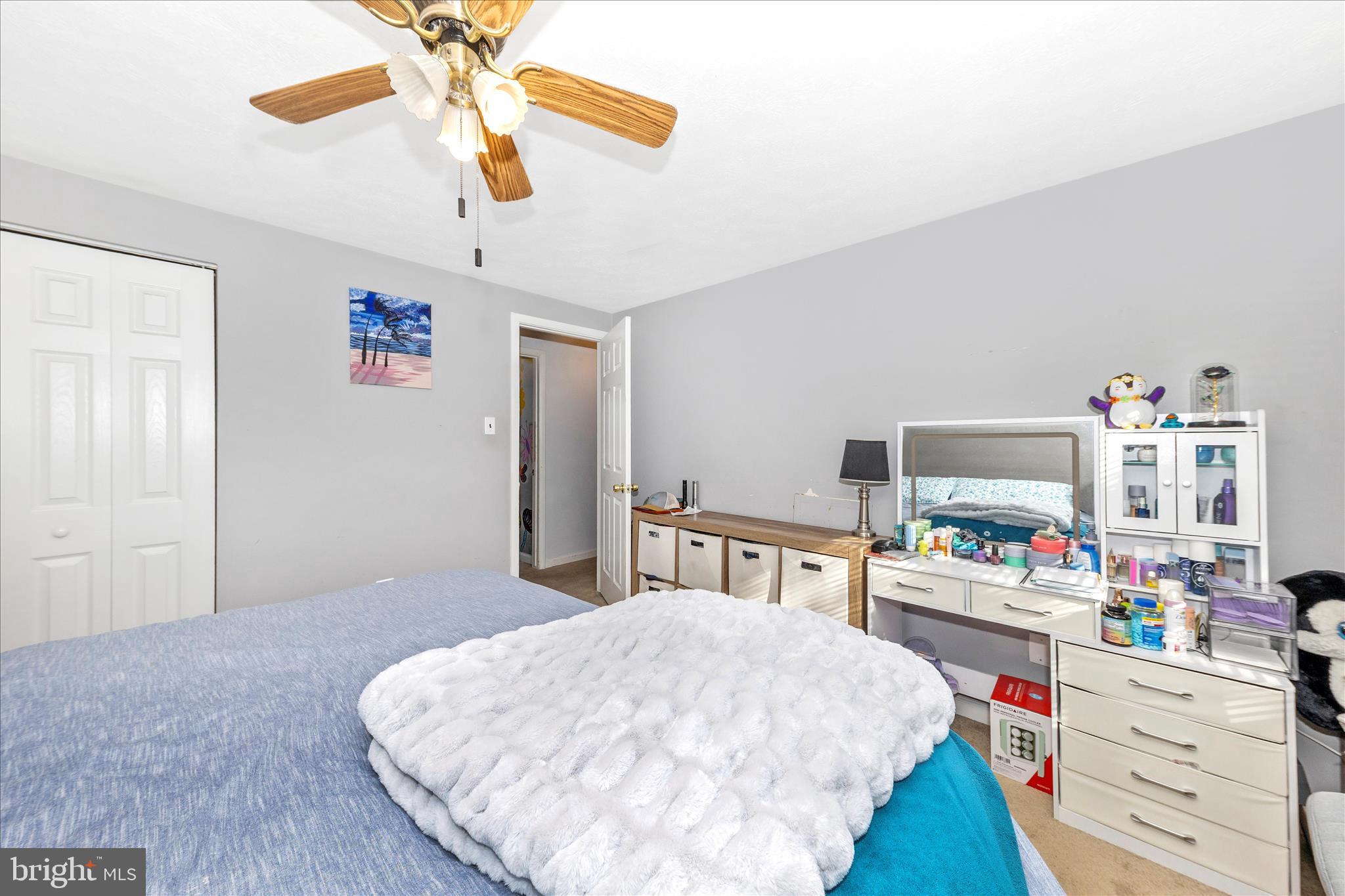 7129 Limestone Lane Middletown, MD 21769 - Photo 19 of 37 a bed room with a bed and a desk