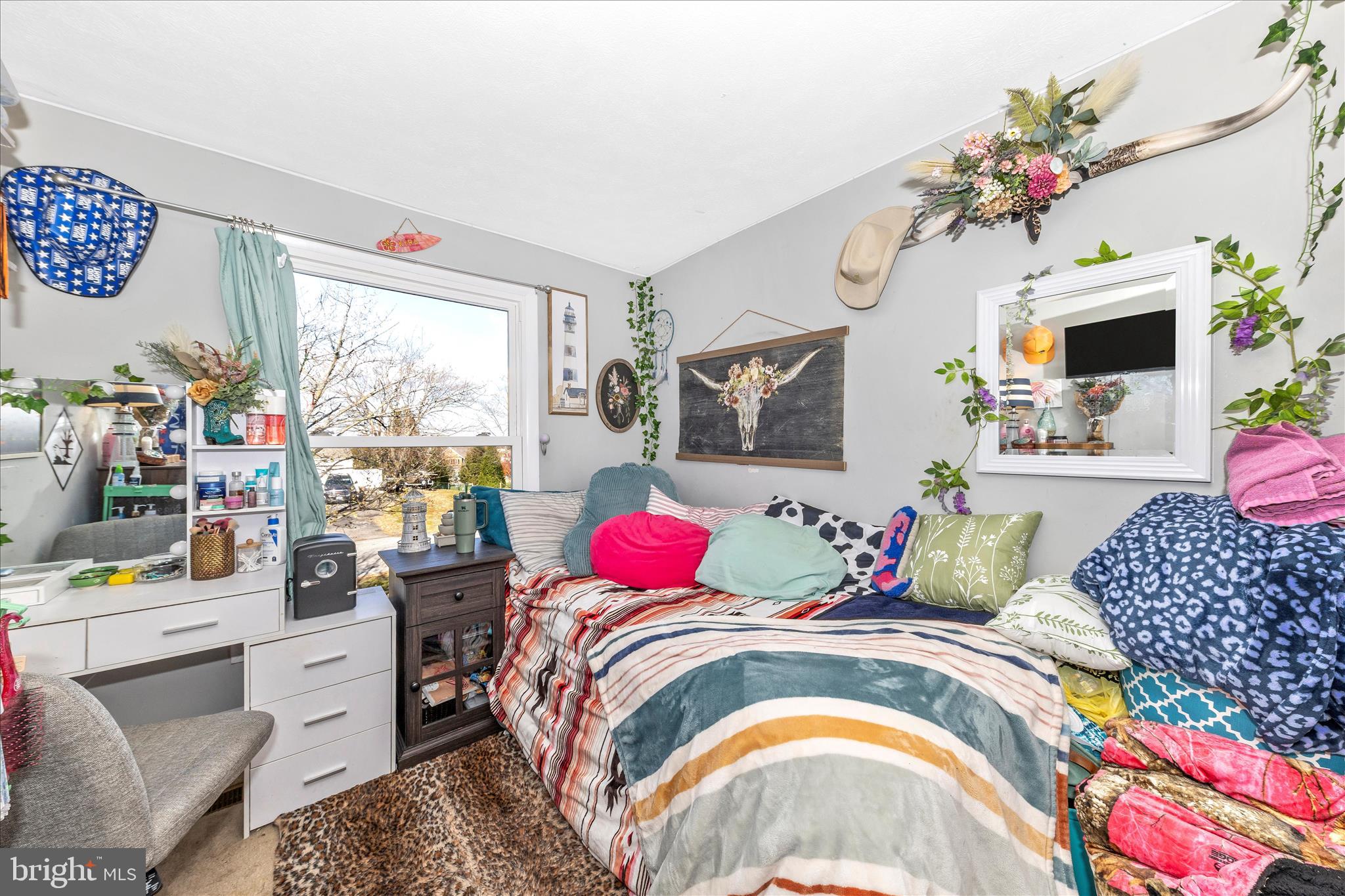 7129 Limestone Lane Middletown, MD 21769 - Photo 20 of 37 a bedroom with a bed and a couch