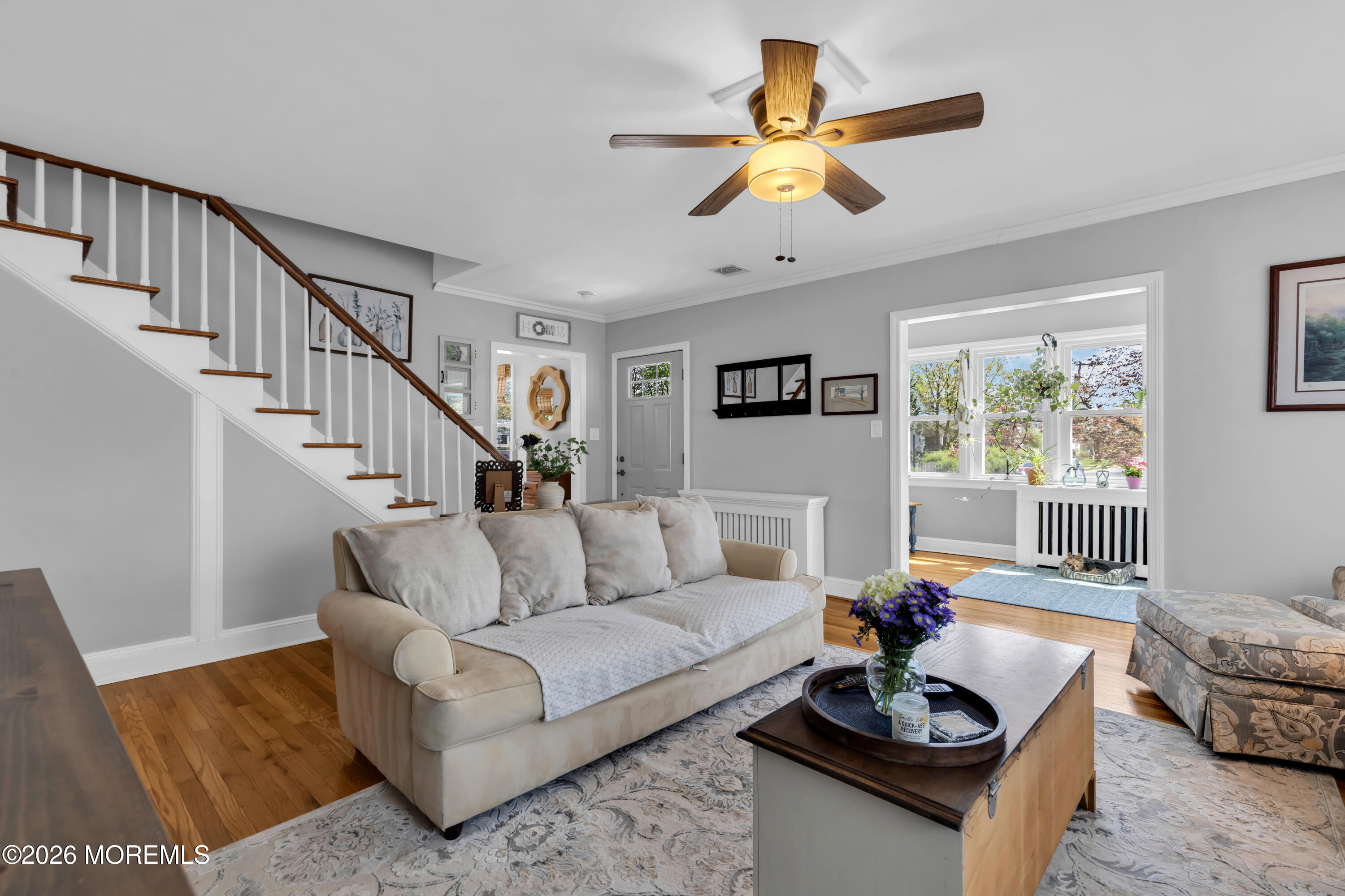 177 Navesink River Road Red Bank, NJ 07701 - Photo 11 of 48 a living room with furniture and a wooden floor