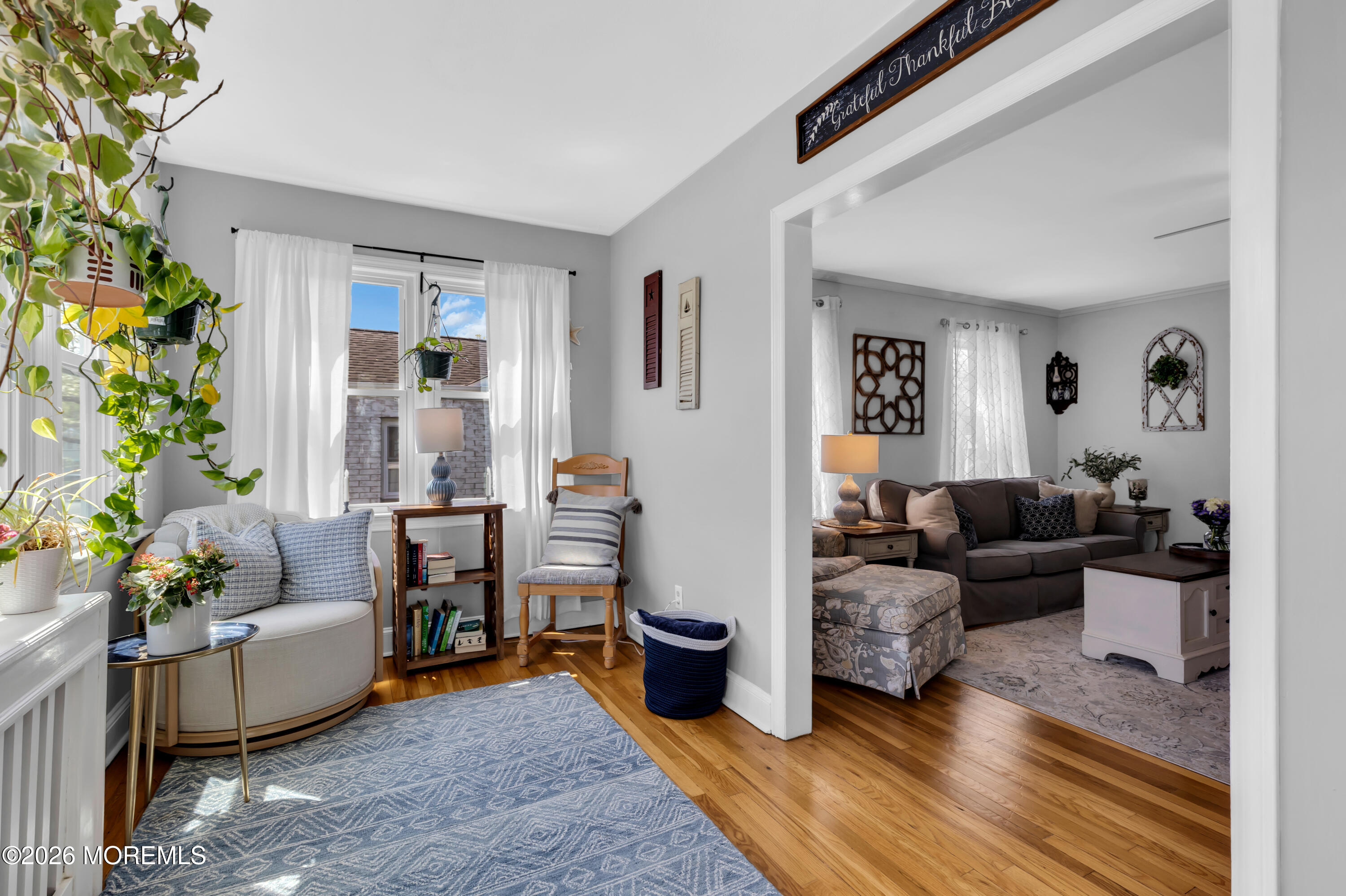 177 Navesink River Road Red Bank, NJ 07701 - Photo 14 of 48 a living room with furniture and a potted plant