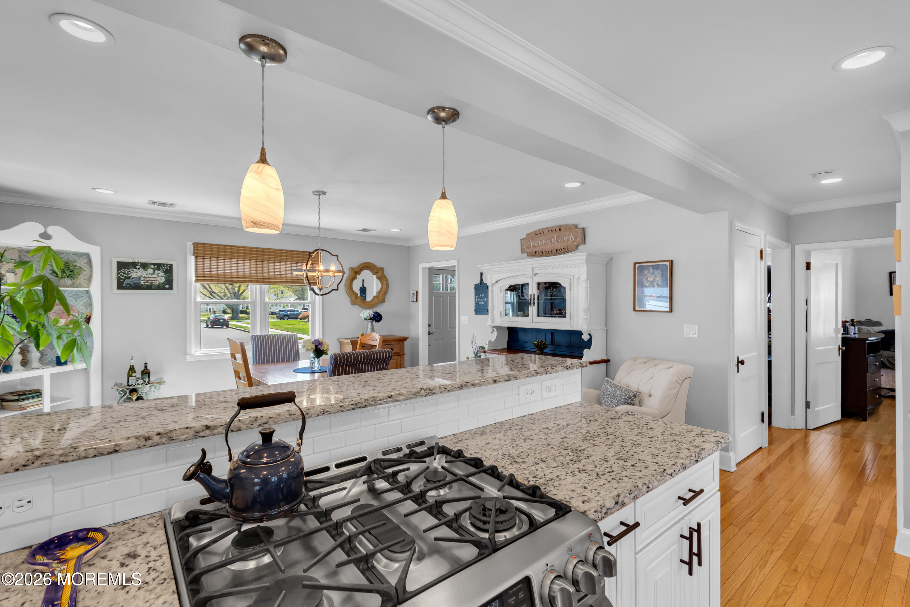 177 Navesink River Road Red Bank, NJ 07701 - Photo 22 of 48 a kitchen with stainless steel appliances granite countertop a stove a sink and a wooden floors