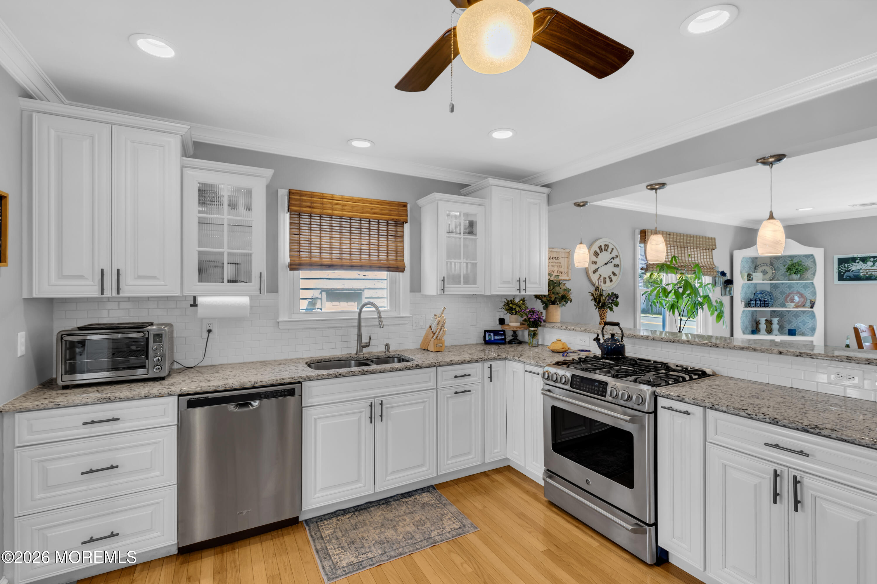 177 Navesink River Road Red Bank, NJ 07701 - Photo 26 of 48 a kitchen with stainless steel appliances a stove sink and microwave