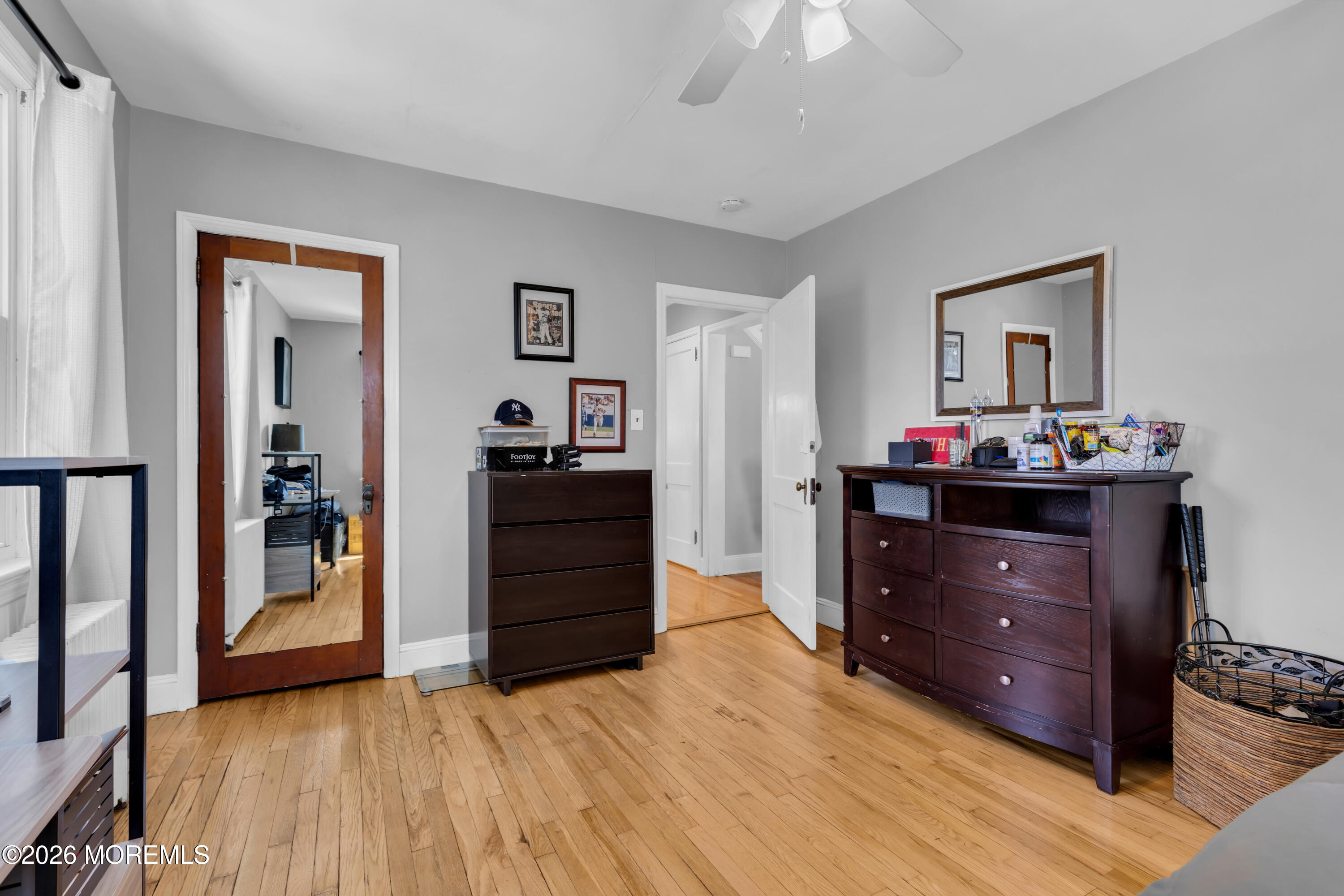 177 Navesink River Road Red Bank, NJ 07701 - Photo 30 of 48 a room with a dresser and a mirror