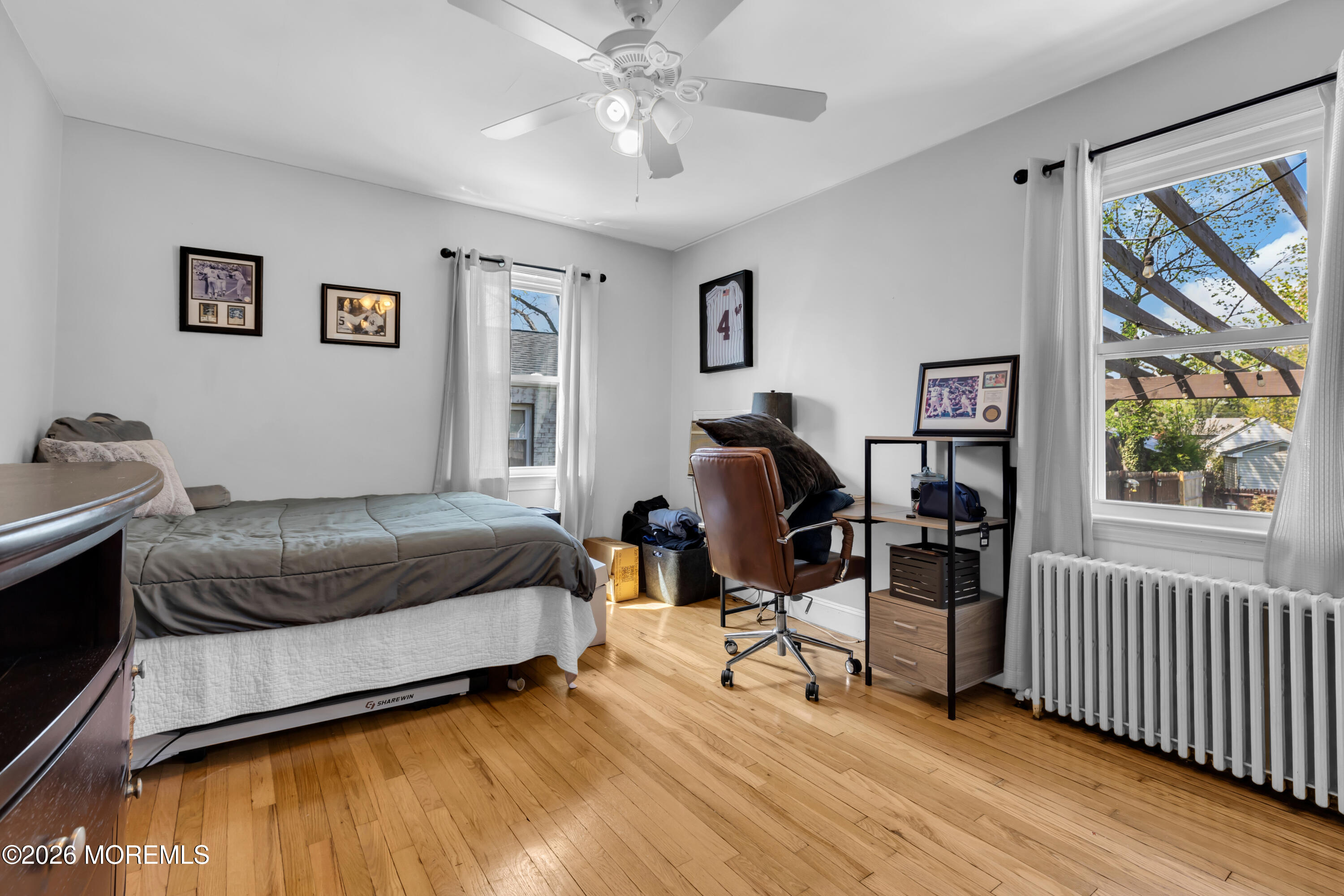 177 Navesink River Road Red Bank, NJ 07701 - Photo 31 of 48 a bedroom with a bed and a window