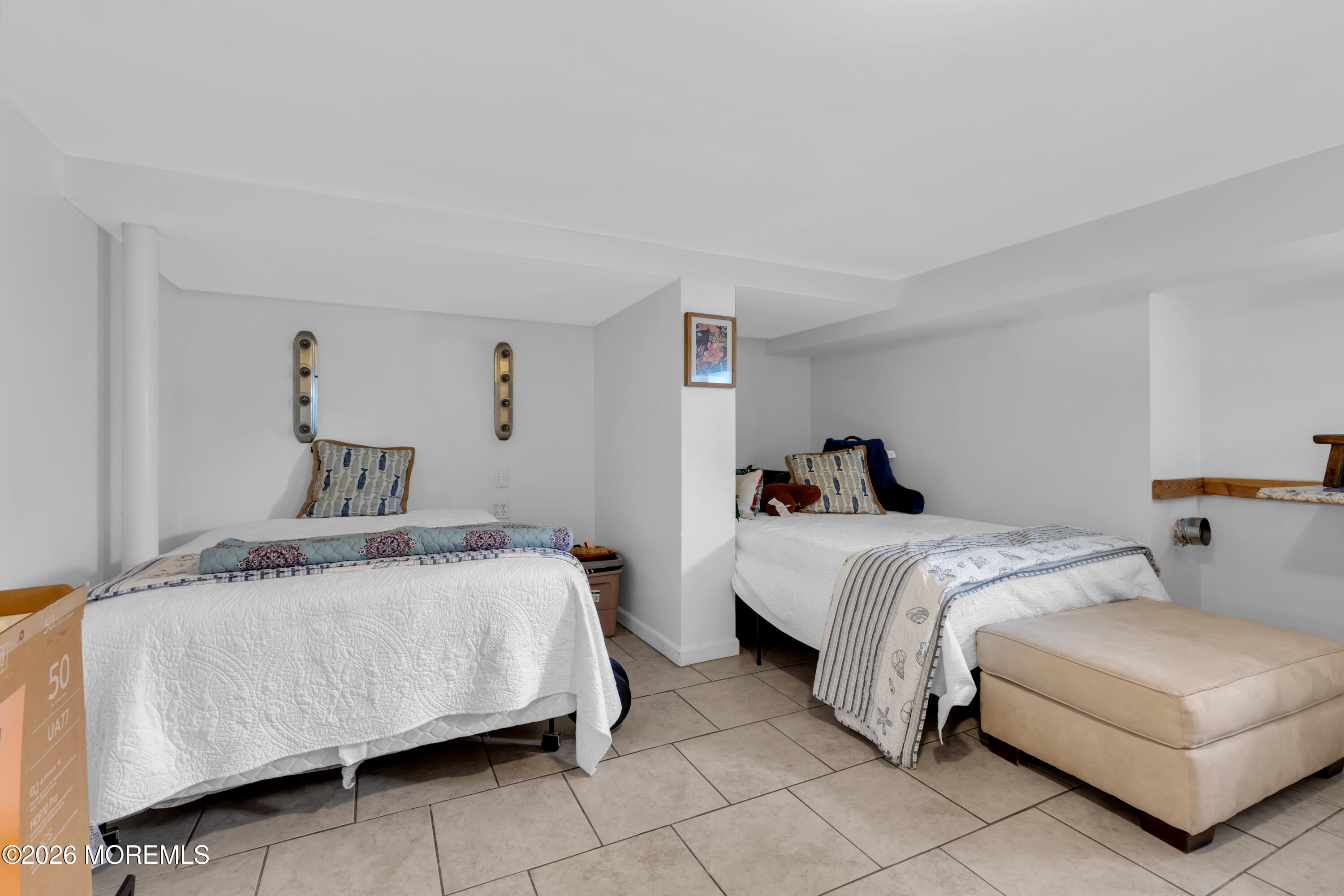 177 Navesink River Road Red Bank, NJ 07701 - Photo 35 of 48 a bedroom with a bed and a couch