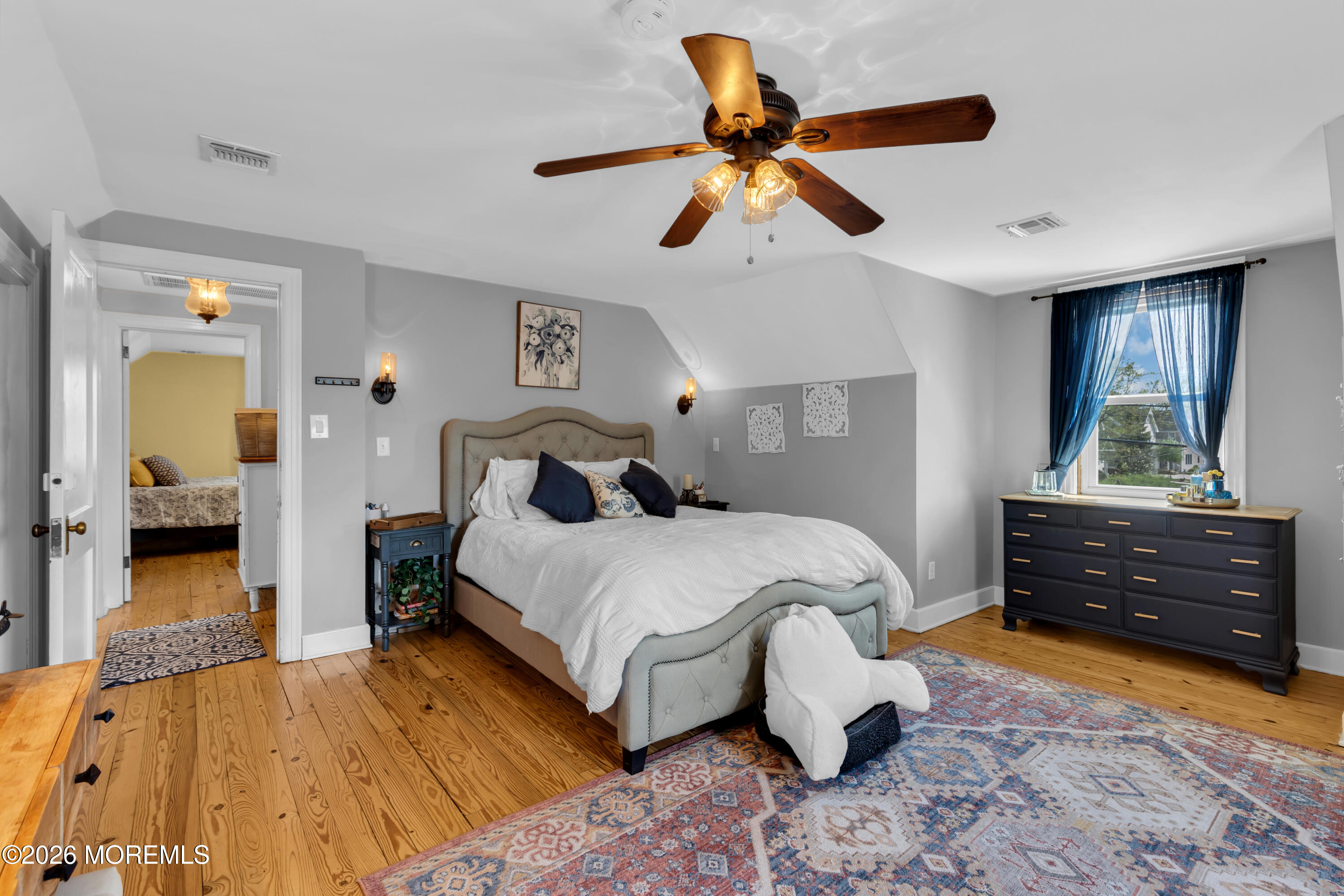 177 Navesink River Road Red Bank, NJ 07701 - Photo 39 of 48 a bedroom with a bed and a dresser