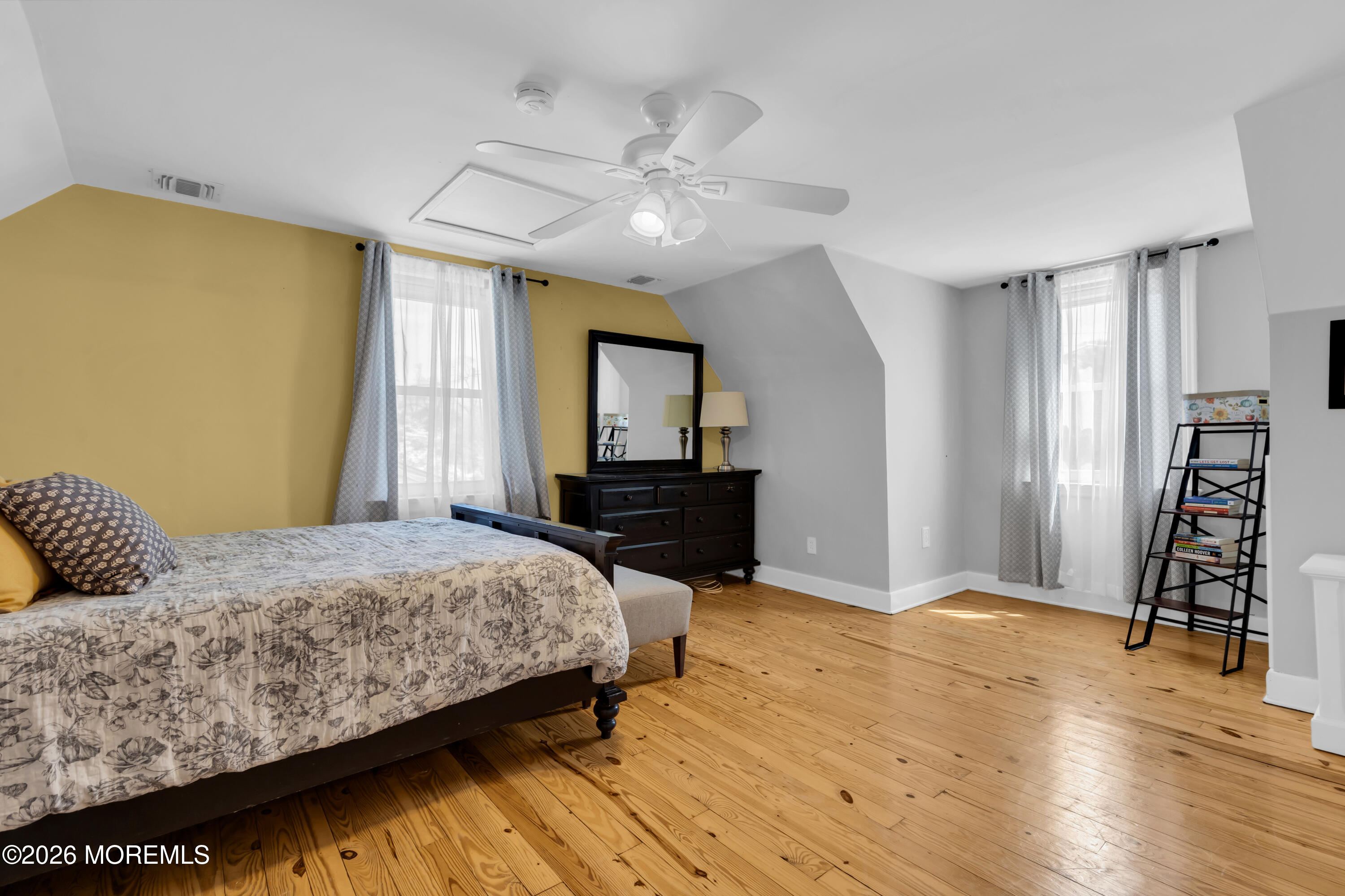 177 Navesink River Road Red Bank, NJ 07701 - Photo 42 of 48 a bedroom with a bed and a flat screen tv