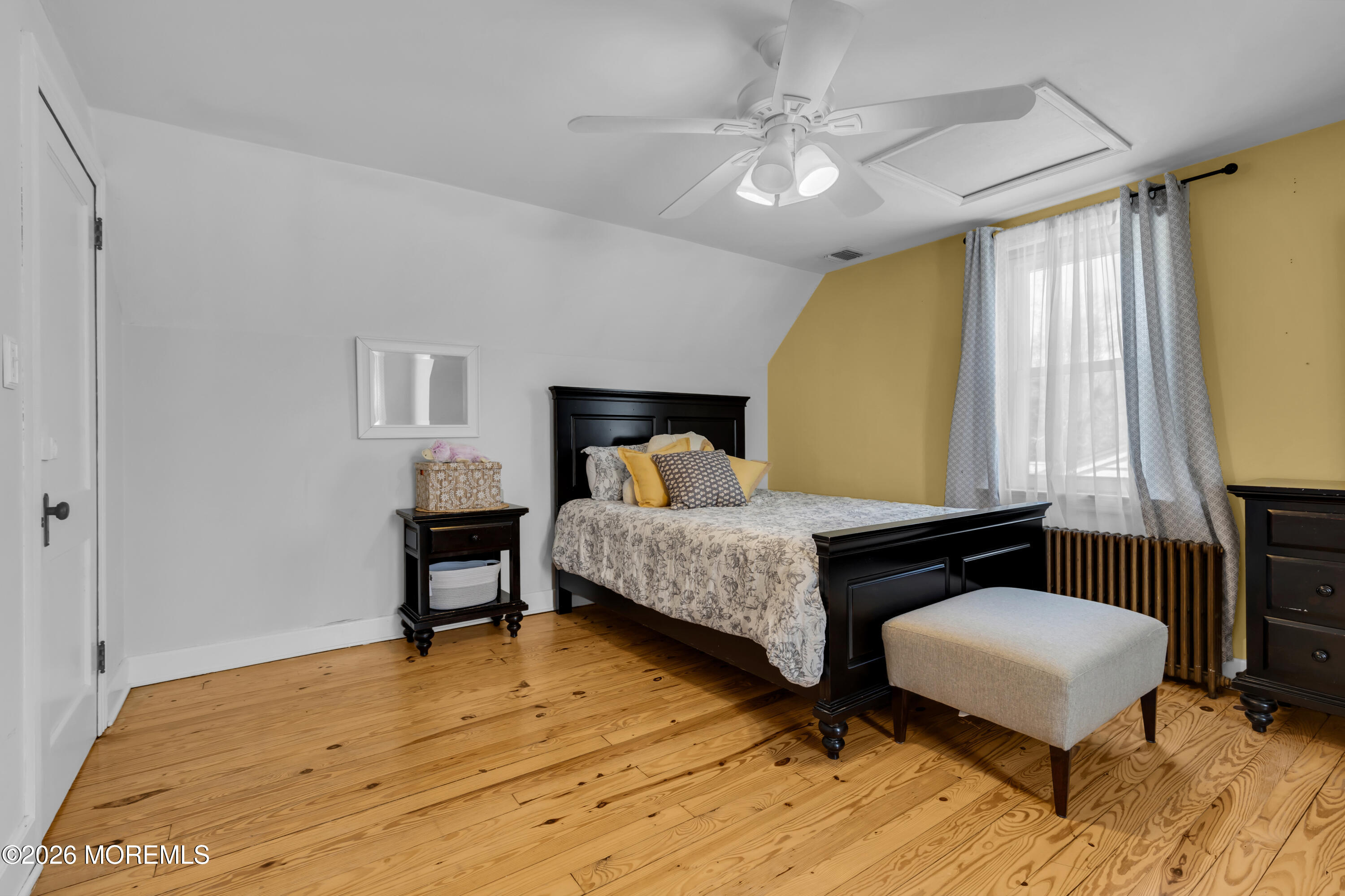 177 Navesink River Road Red Bank, NJ 07701 - Photo 43 of 48 a bedroom with a bed lamps and window