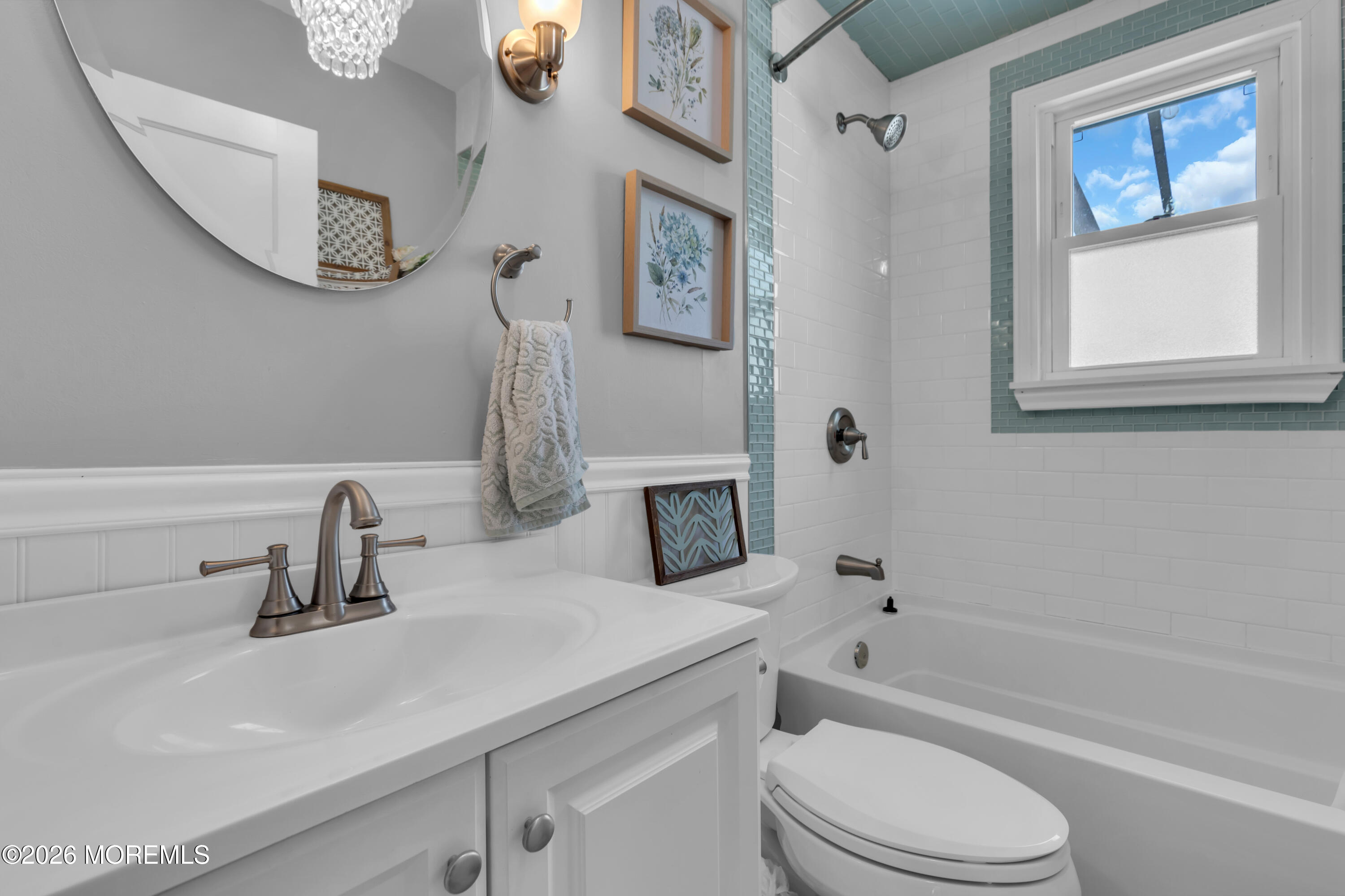 177 Navesink River Road Red Bank, NJ 07701 - Photo 45 of 48 a bathroom with a sink a toilet and a bathtub