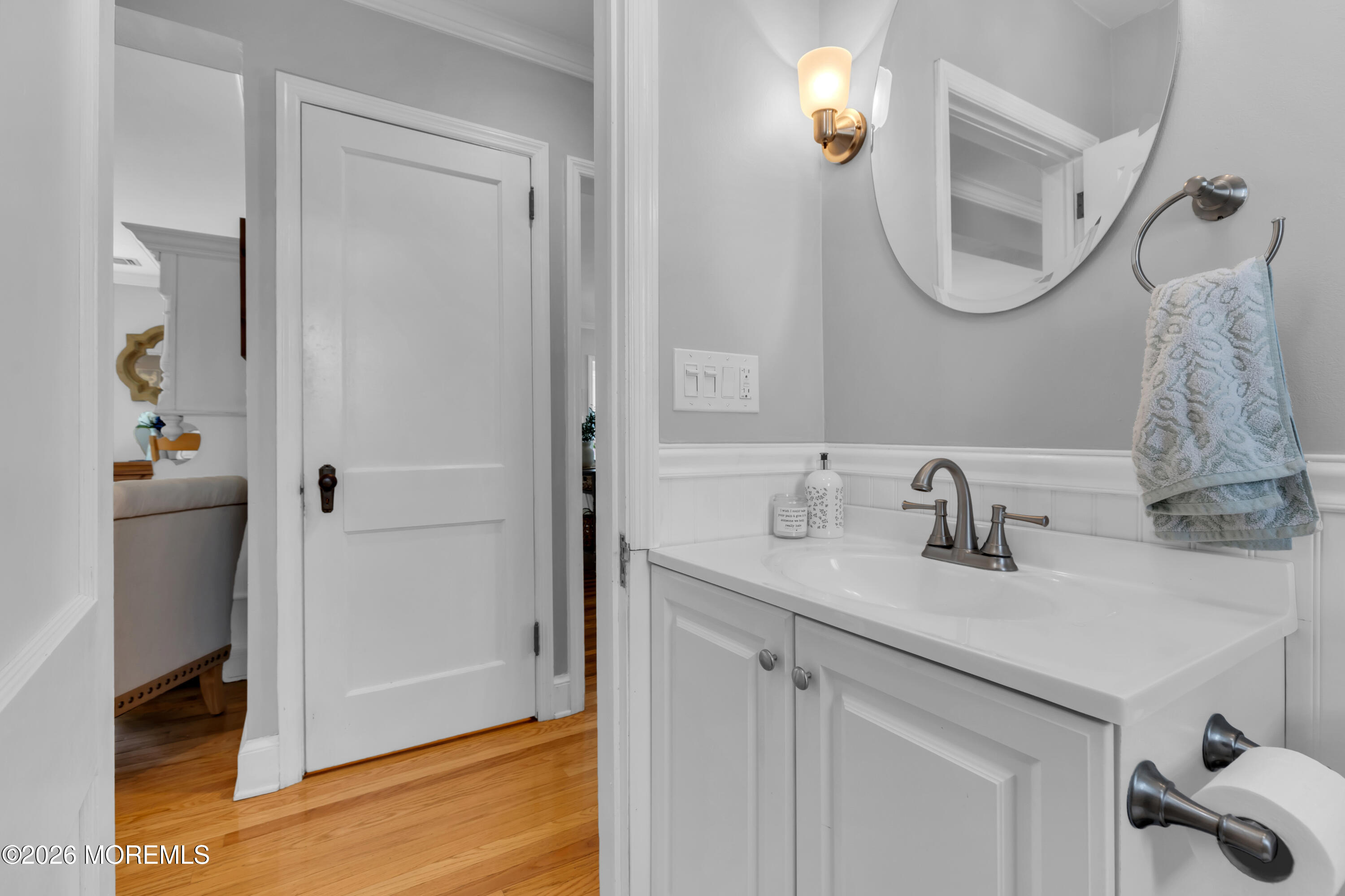 177 Navesink River Road Red Bank, NJ 07701 - Photo 46 of 48 a bathroom with a sink vanity and a mirror