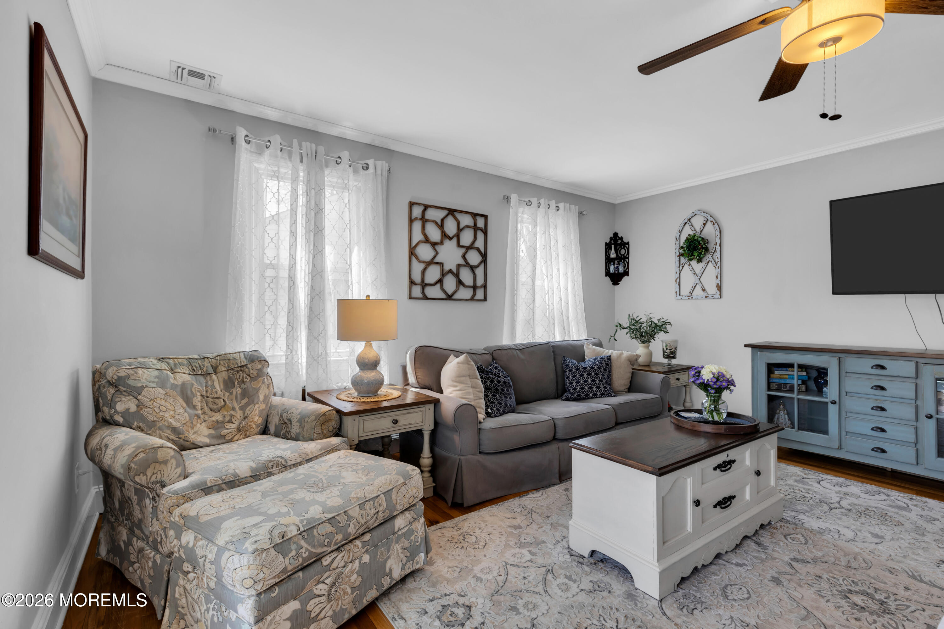 177 Navesink River Road Red Bank, NJ 07701 - Photo 9 of 48 a living room with furniture and a flat screen tv