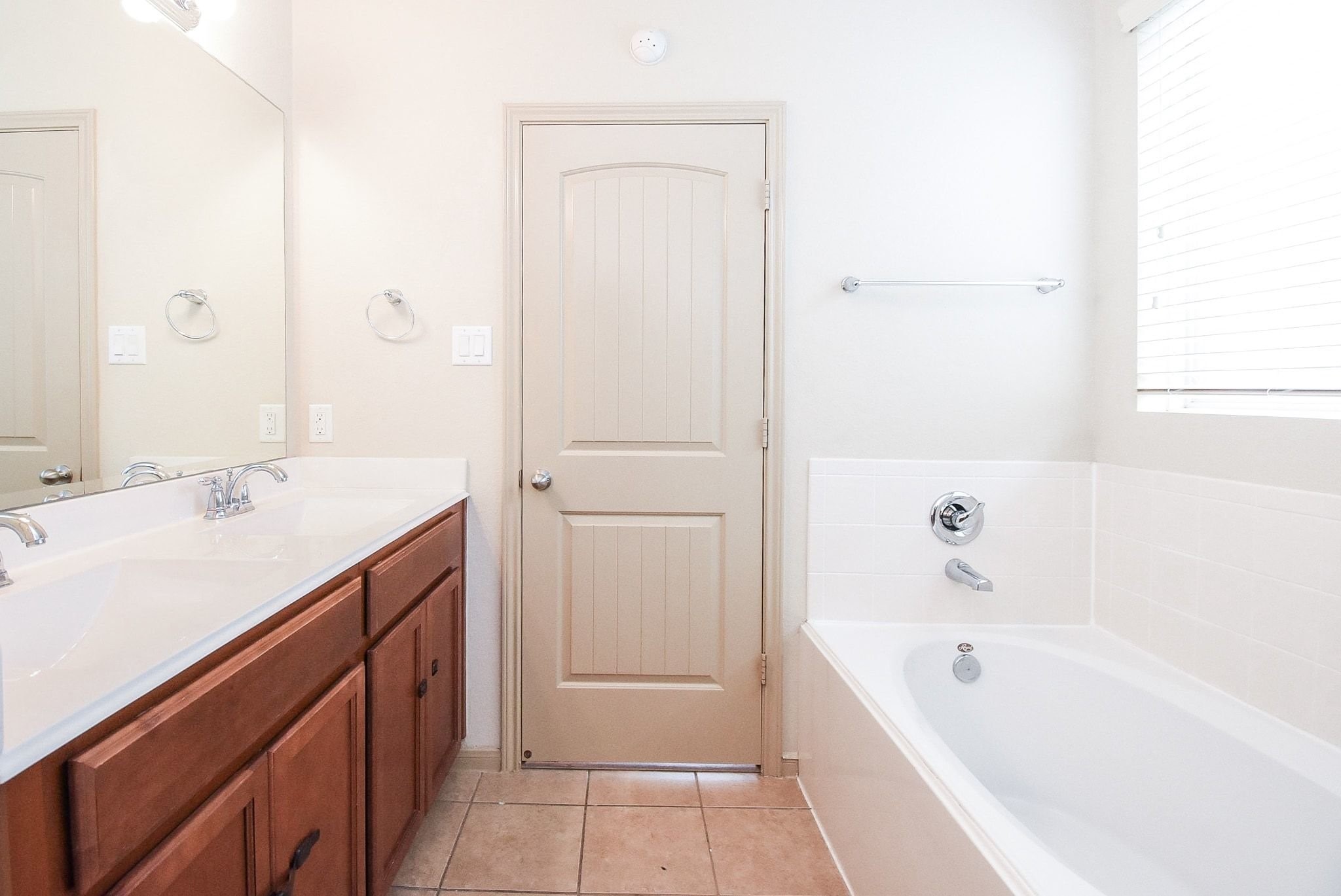 2106 Harmon Crest Court Spring, TX 77373 - Photo 23 of 37 a bathroom with a tub sink and mirror