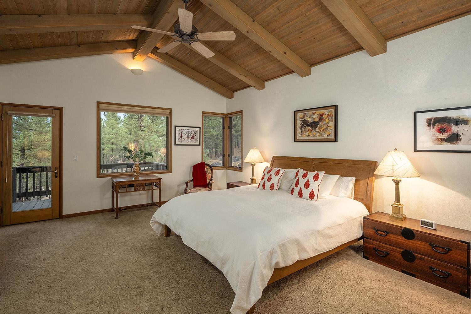 878 Deer Trail Clio, CA 96106 - Photo 14 of 21 a bed room with a bed and a couch