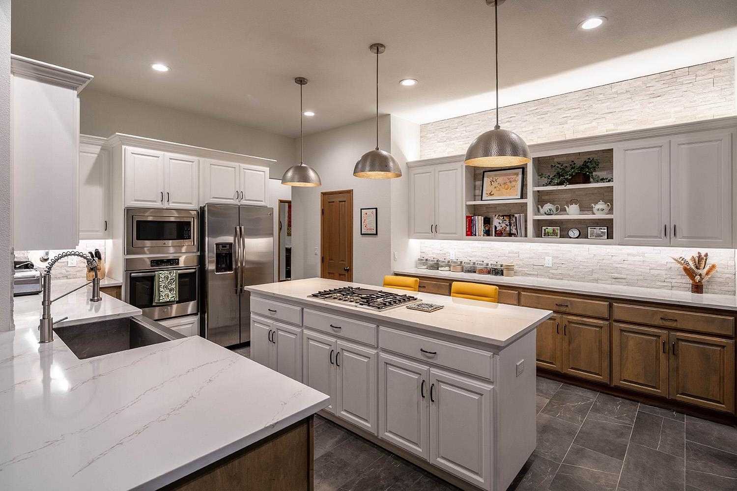 878 Deer Trail Clio, CA 96106 - Photo 8 of 21 a kitchen that has a lot of cabinets a sink and appliances