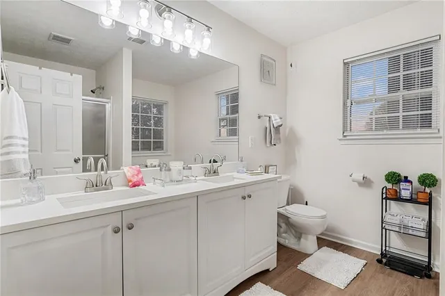 a bathroom with a bathtub and a window