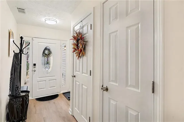 a view of front door with hallway