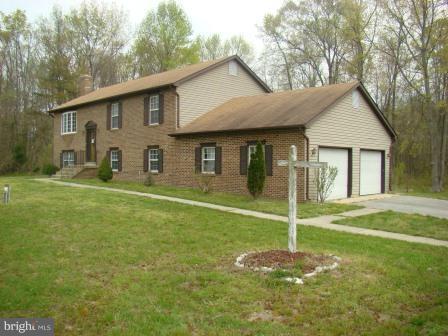 3370 Malcolm Road Brandywine, MD 20613 - Photo 11 of 19 a backyard of a house with table and chairs