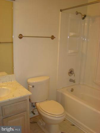 3370 Malcolm Road Brandywine, MD 20613 - Photo 13 of 19 a white toilet sitting next to a bath tub