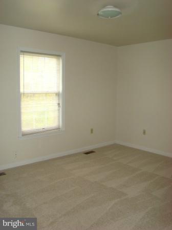 3370 Malcolm Road Brandywine, MD 20613 - Photo 14 of 19 an empty room with a window
