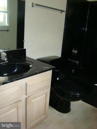 3370 Malcolm Road Brandywine, MD 20613 - Photo 18 of 19 a kitchen with a sink and a stove