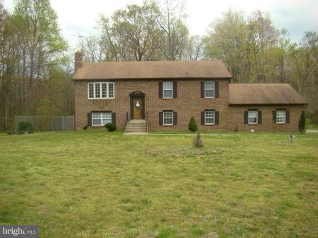 3370 Malcolm Road Brandywine, MD 20613 - Photo 19 of 19 a front view of a house with garden