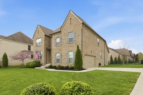 a front view of house with yard