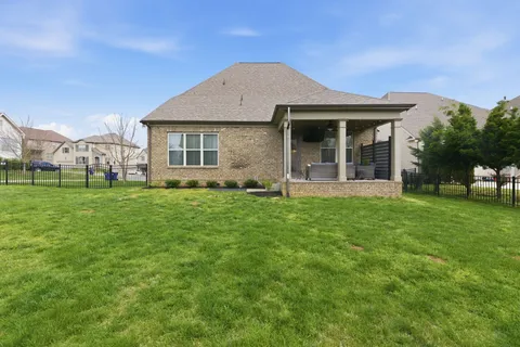 an aerial view of a house with a garden