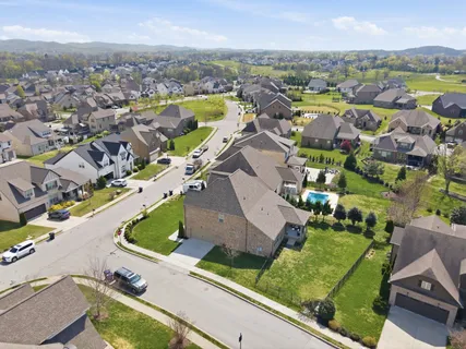 an aerial view of a city with lots of residential buildings