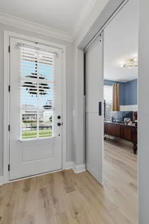 a view of livingroom with furniture and a window