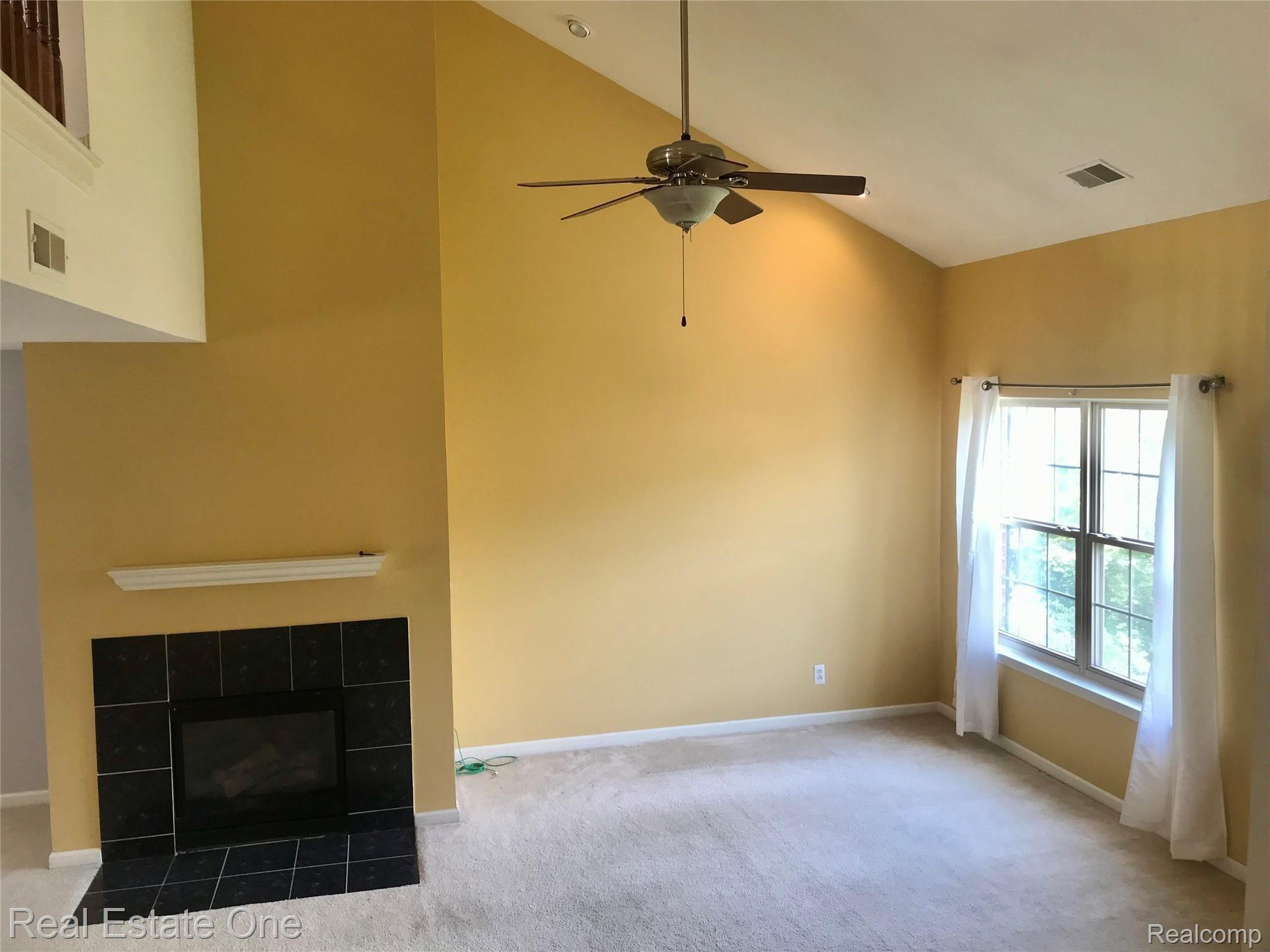 16918 Farmington Road Livonia, MI 48154 - Photo 8 of 21 FIREPLACE W/LARGE WINDOW