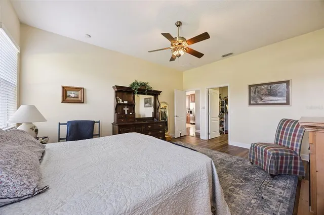 a bathroom with a tub a sink and shower