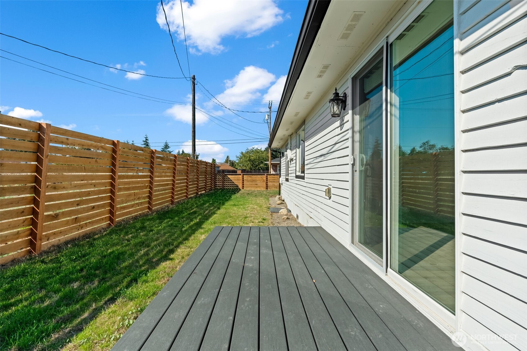 14915 Portland Avenue Southwest Lakewood, WA 98498 - Photo 22 of 29 a view of a balcony with wooden floor