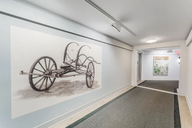 a view of a garage with a table and chairs