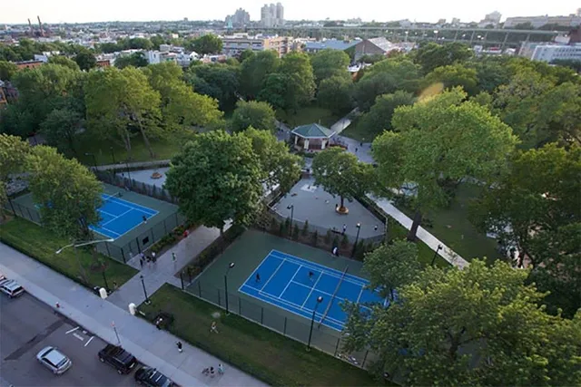 an aerial view of a house with a garden